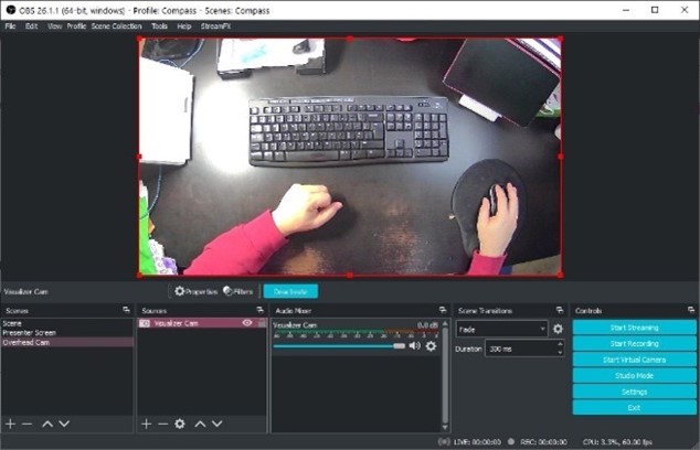 Screenshot of overhead view as shown in OBS, flipped depiction so hands/arms showing on bottom of screen.